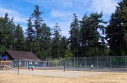 Three tennis courts, volleyball court, and kids playground