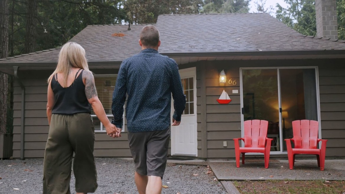 Walking up to a Forest Cottage at Beach Acres Resort